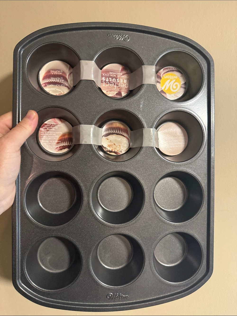 Wilton 12-Cup Nonstick Muffin Pan in Black